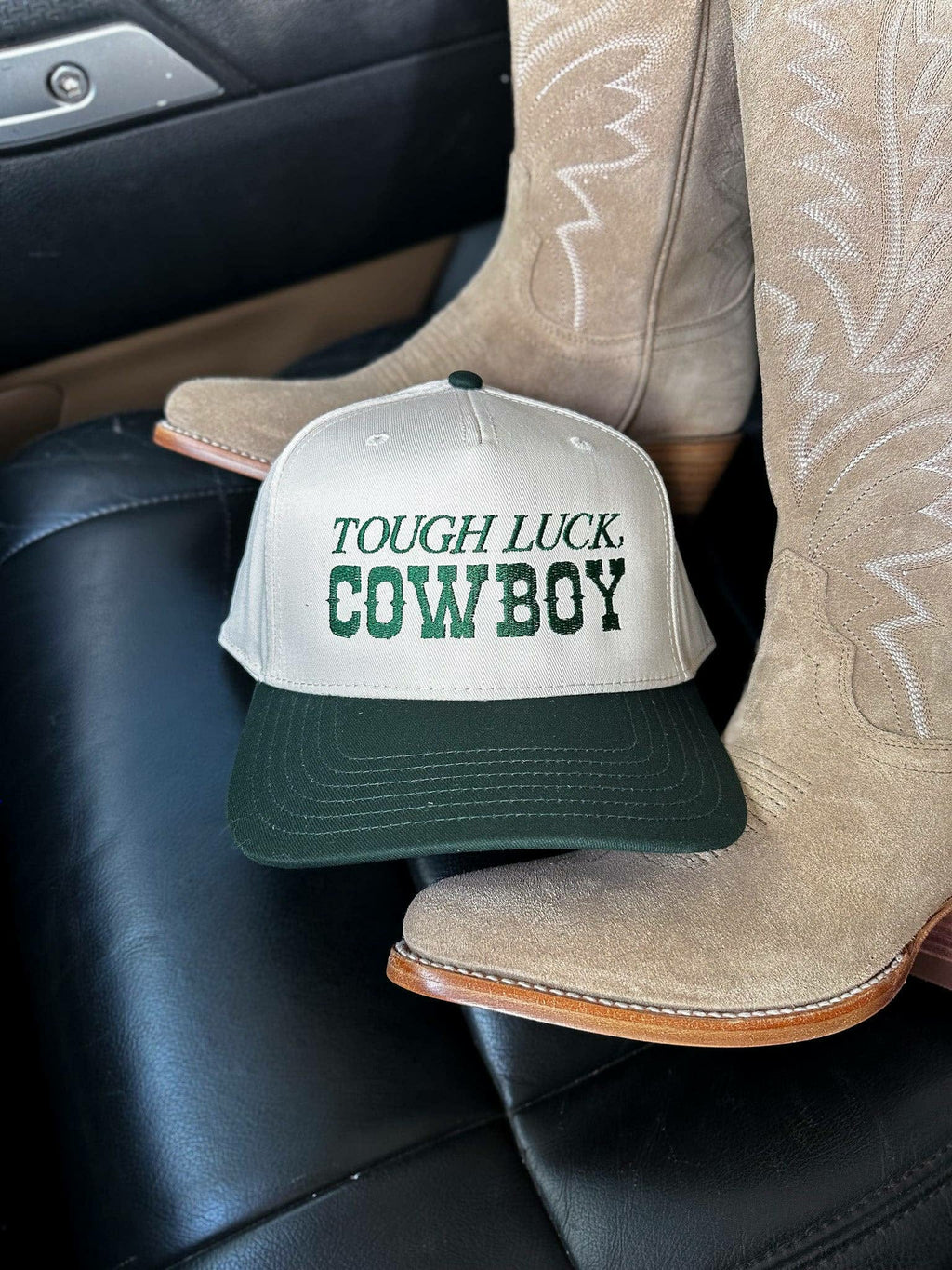 Cream and forest green trucker cap with embroidered Tough Luck Cowboy