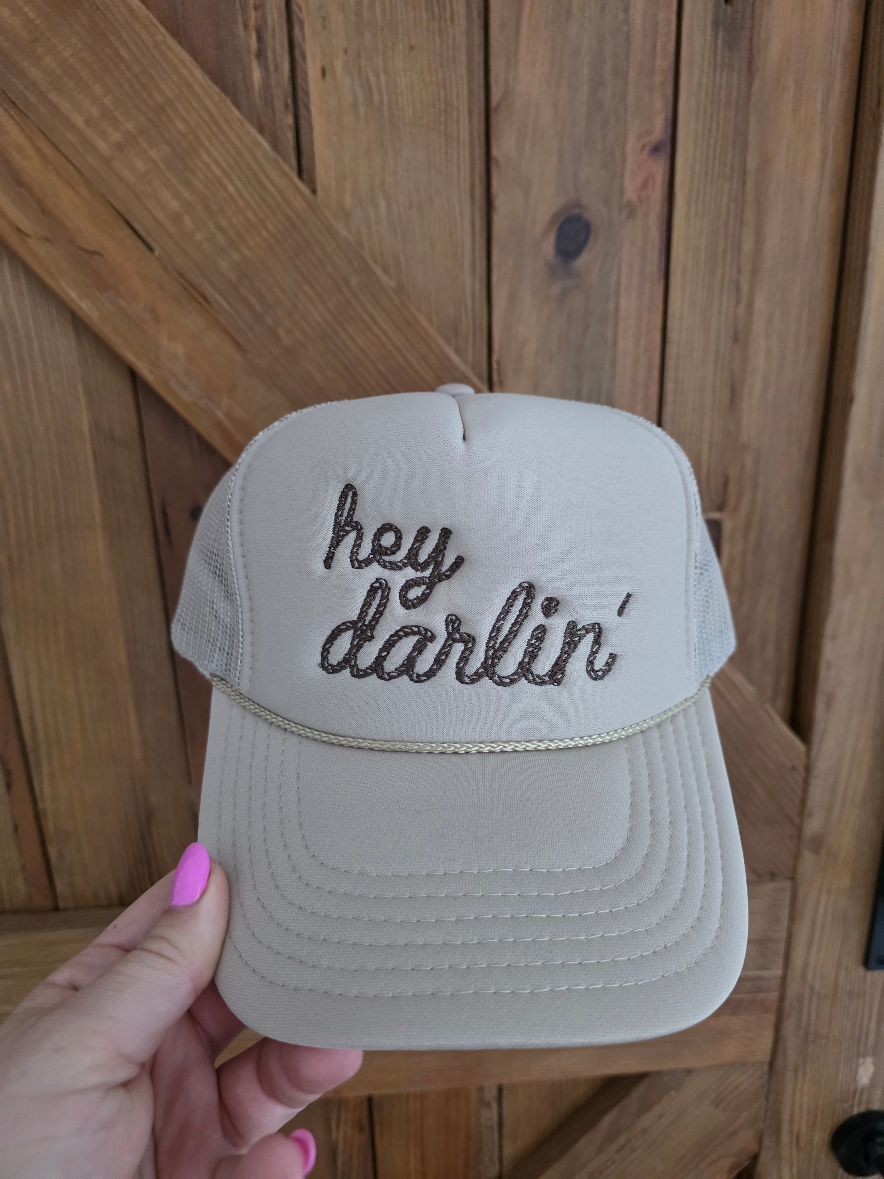Cream five panel mesh back trucker cap with brown Hey Darlin embroidered front detailing