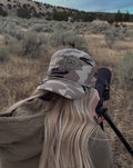 Neutral camo western camo cap with lucky playing cards graphic, with horseshoe detail and rope trim detail on five panel mesh back cap 