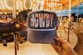 Grey stone trucker cap with bold howdy desert cowboy graphic and white rope detail,