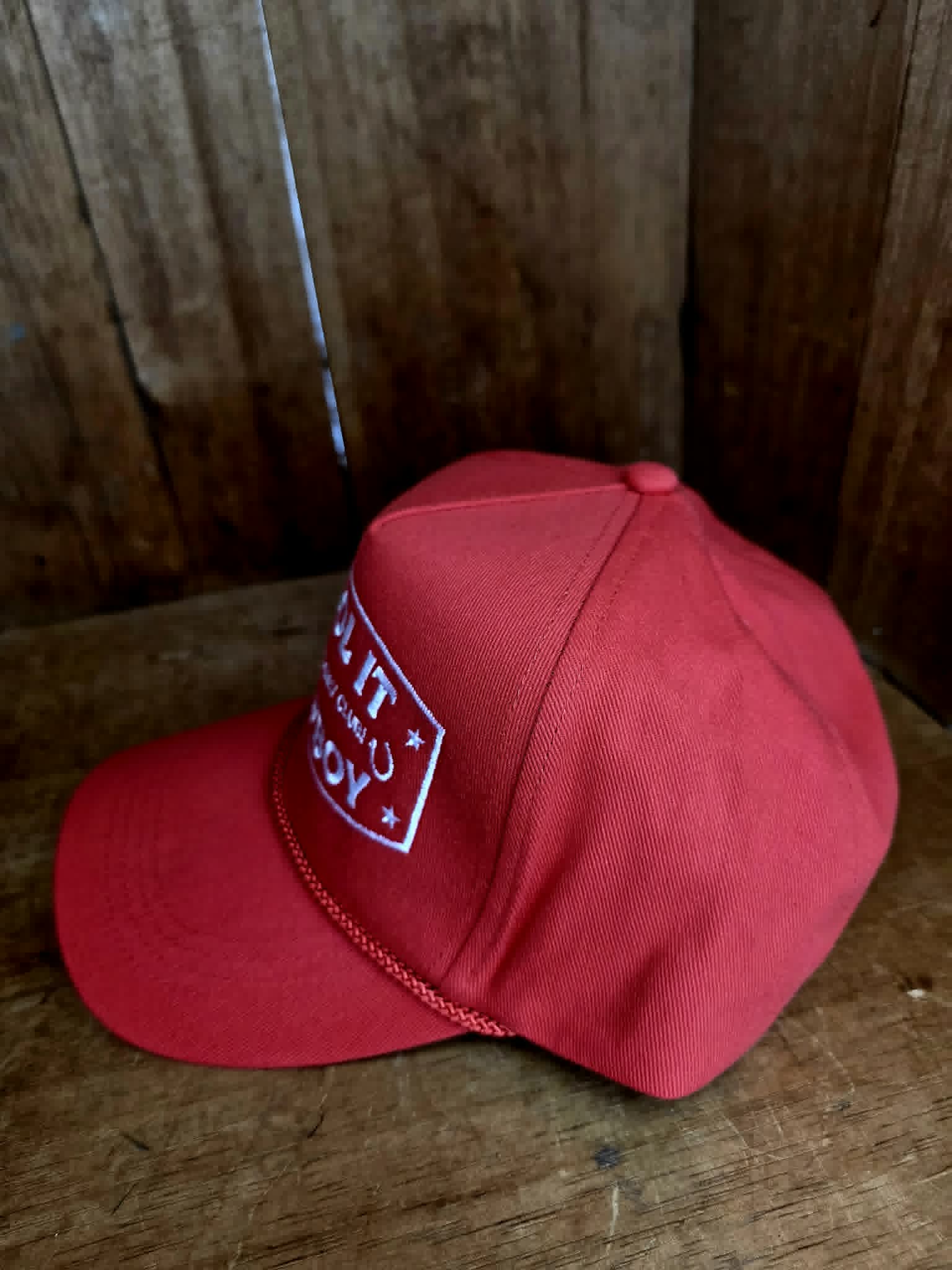 Statement red cowboy trucker cap with crisp white embroidered "Cool It Cowboy" design, cowgirls only club detailing, and retro western aesthetic ideal for festival fashion and everyday country wear